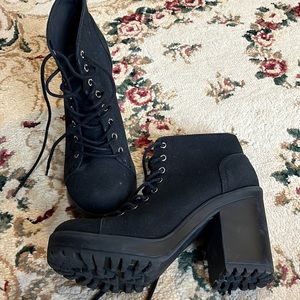 Gently worn black platform boots